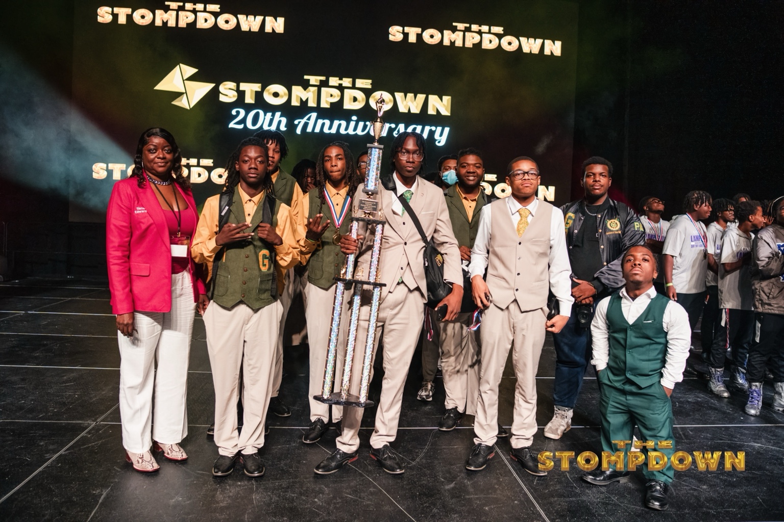 Team celebrating a championship award at The Stompdown