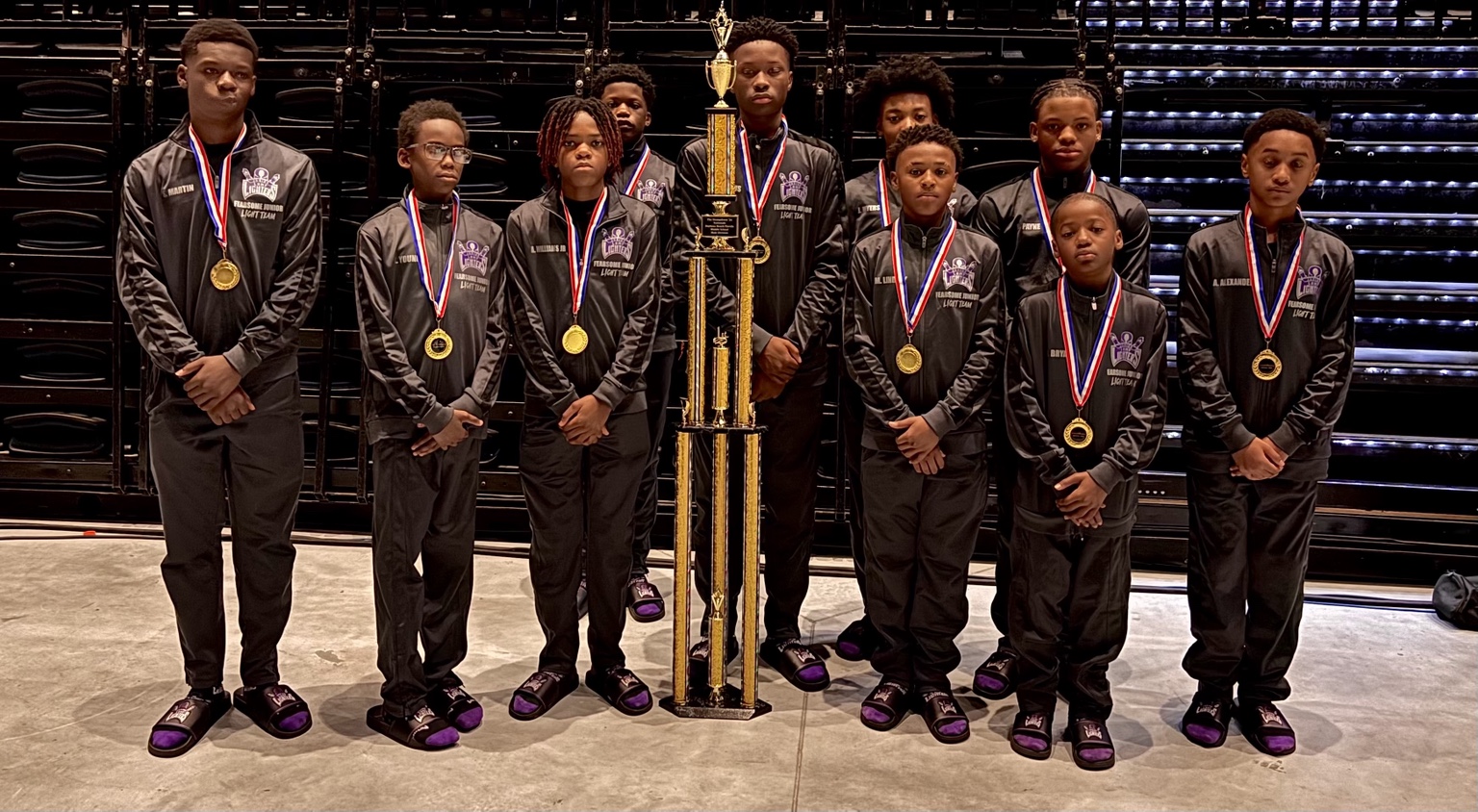 Youth championship team with medals and trophy